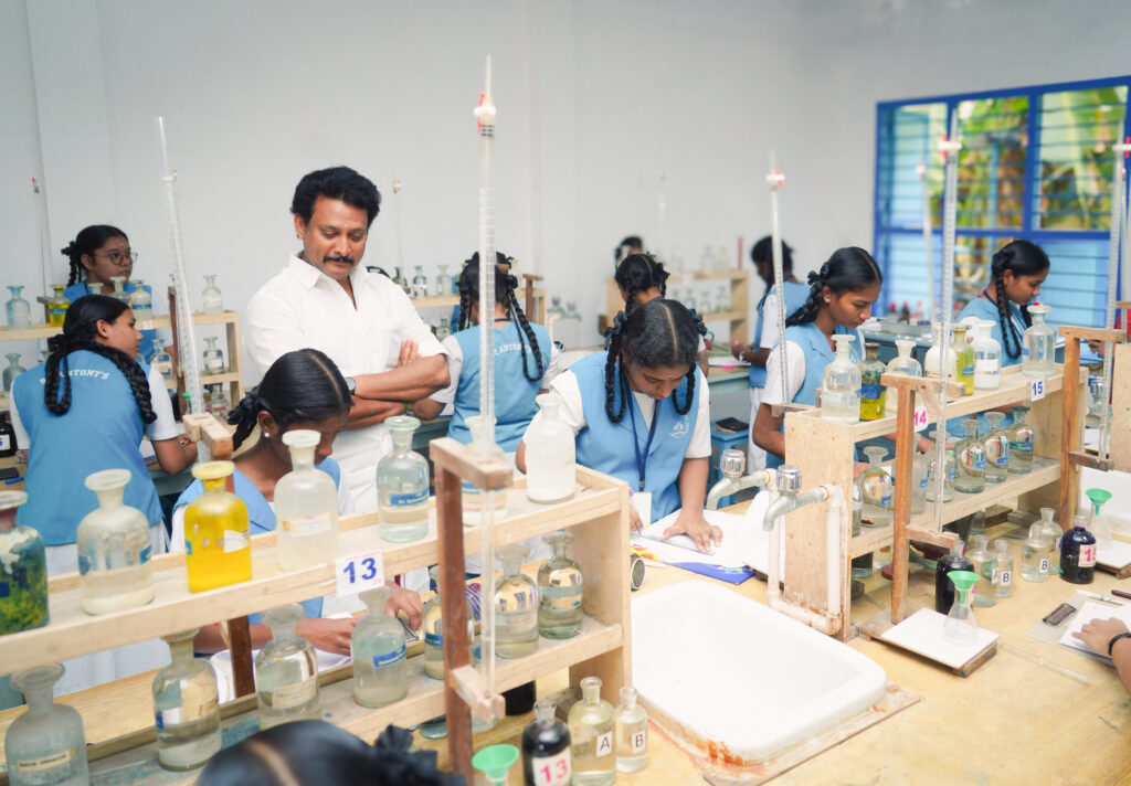 Anbil Mahesh Poyyamozhi inspecting board practical exam
