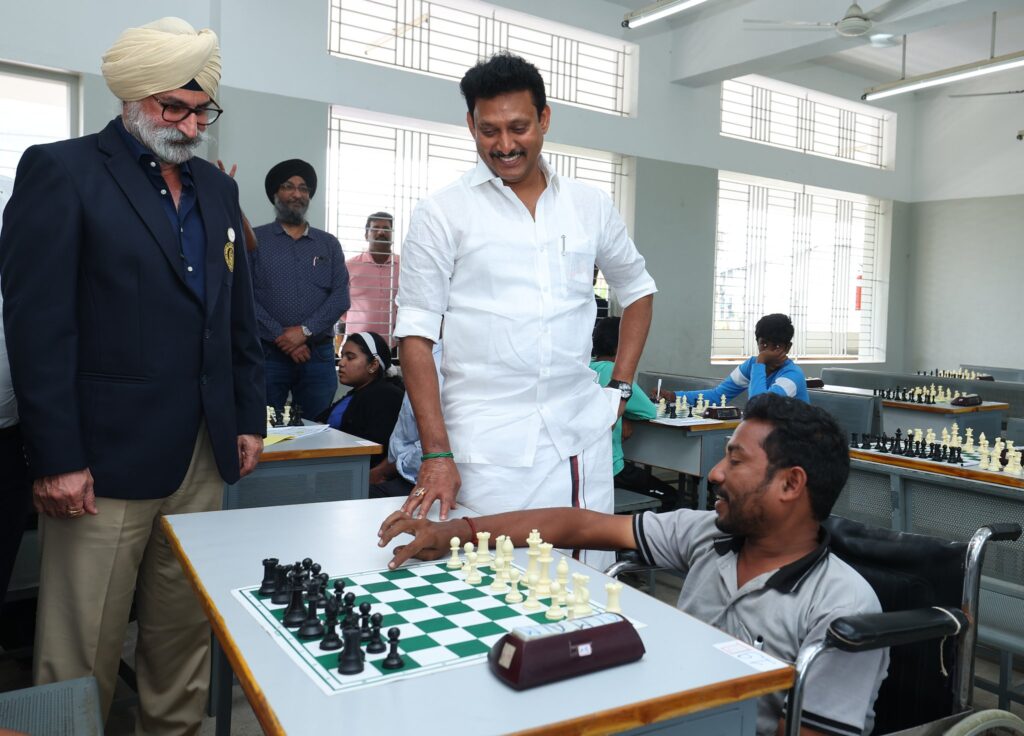 Minister interacting with students with special needs