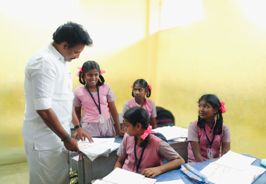 234/77 minister visit Government school and interacting with students