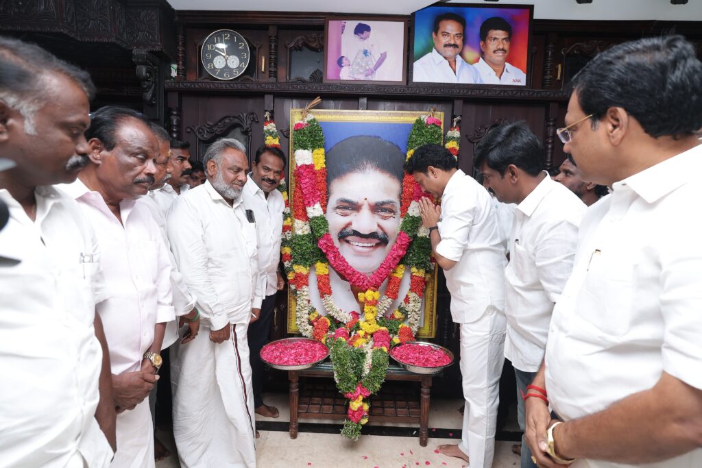 Anbil mahesh paid floral tribute to Minister Thiru. Selvaraj, his decorated portrait at his residence.