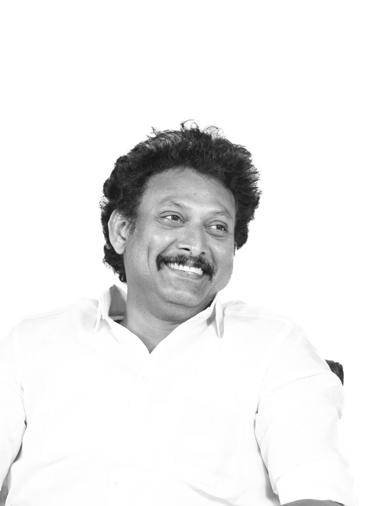 happy face of Anbiol mahesh in Monochrome