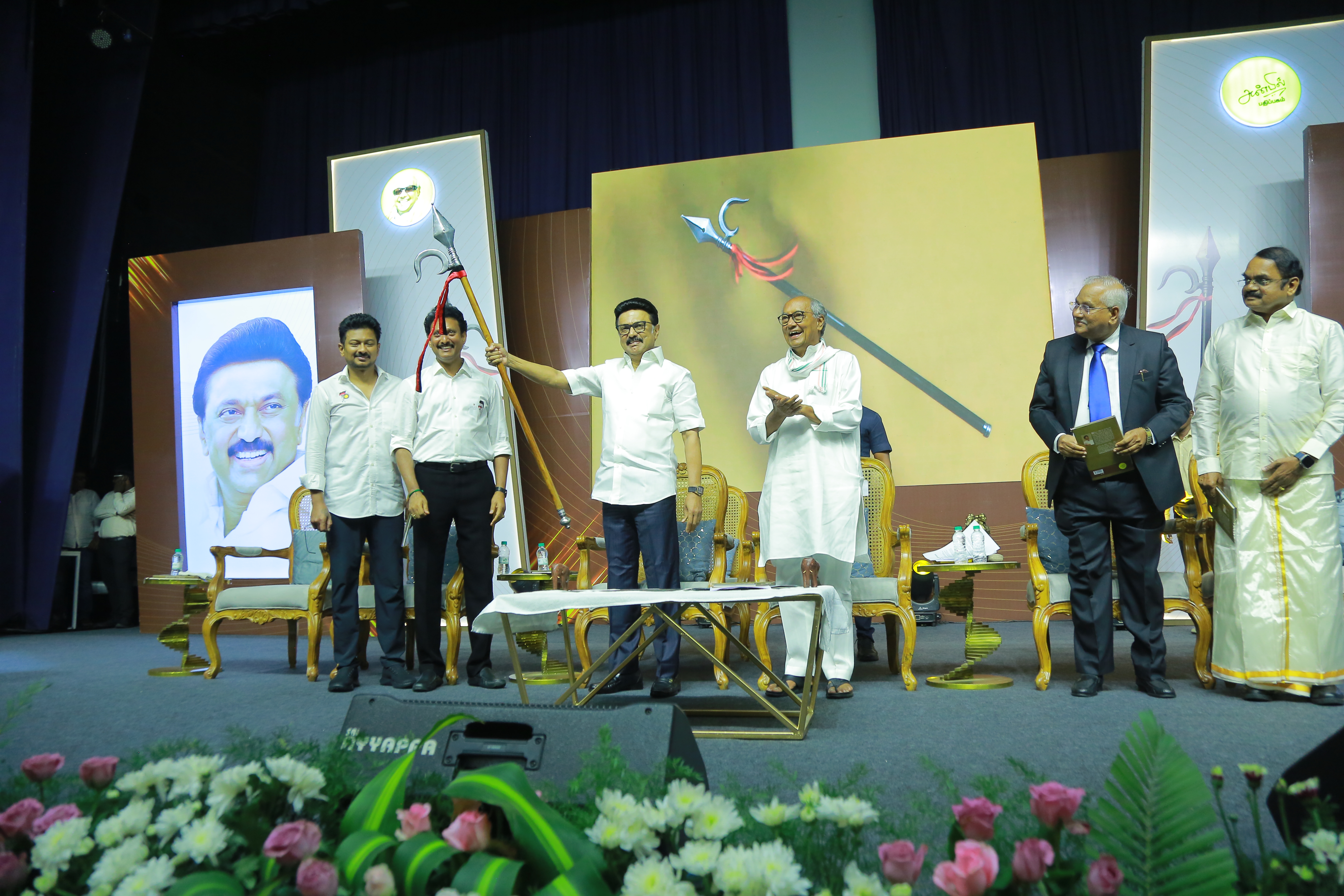 M K Stalin holding the goad