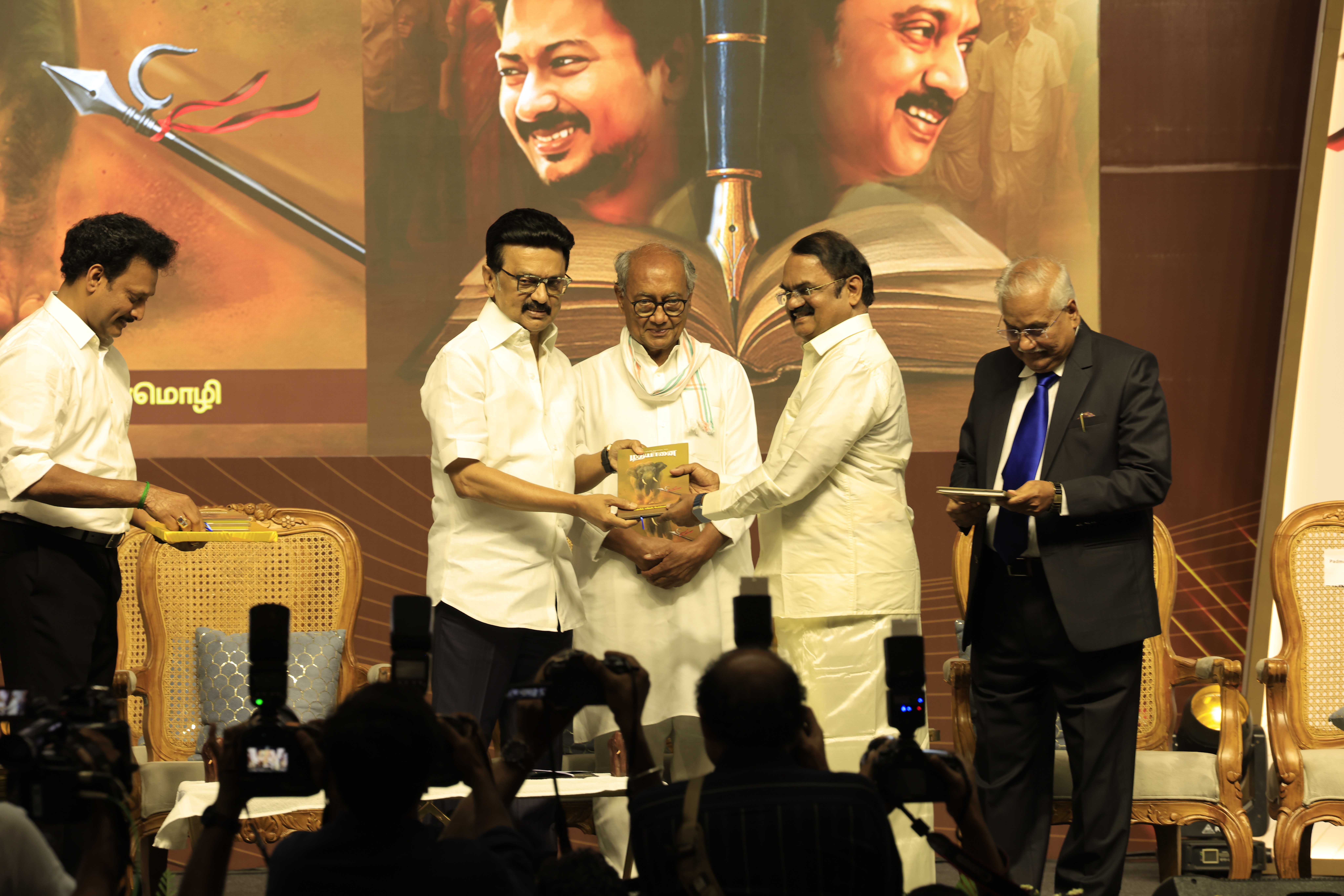 Chief Minister M. K. Stalin presenting the book "Madhayaanai" to Dr.Myslwamy Annadurai