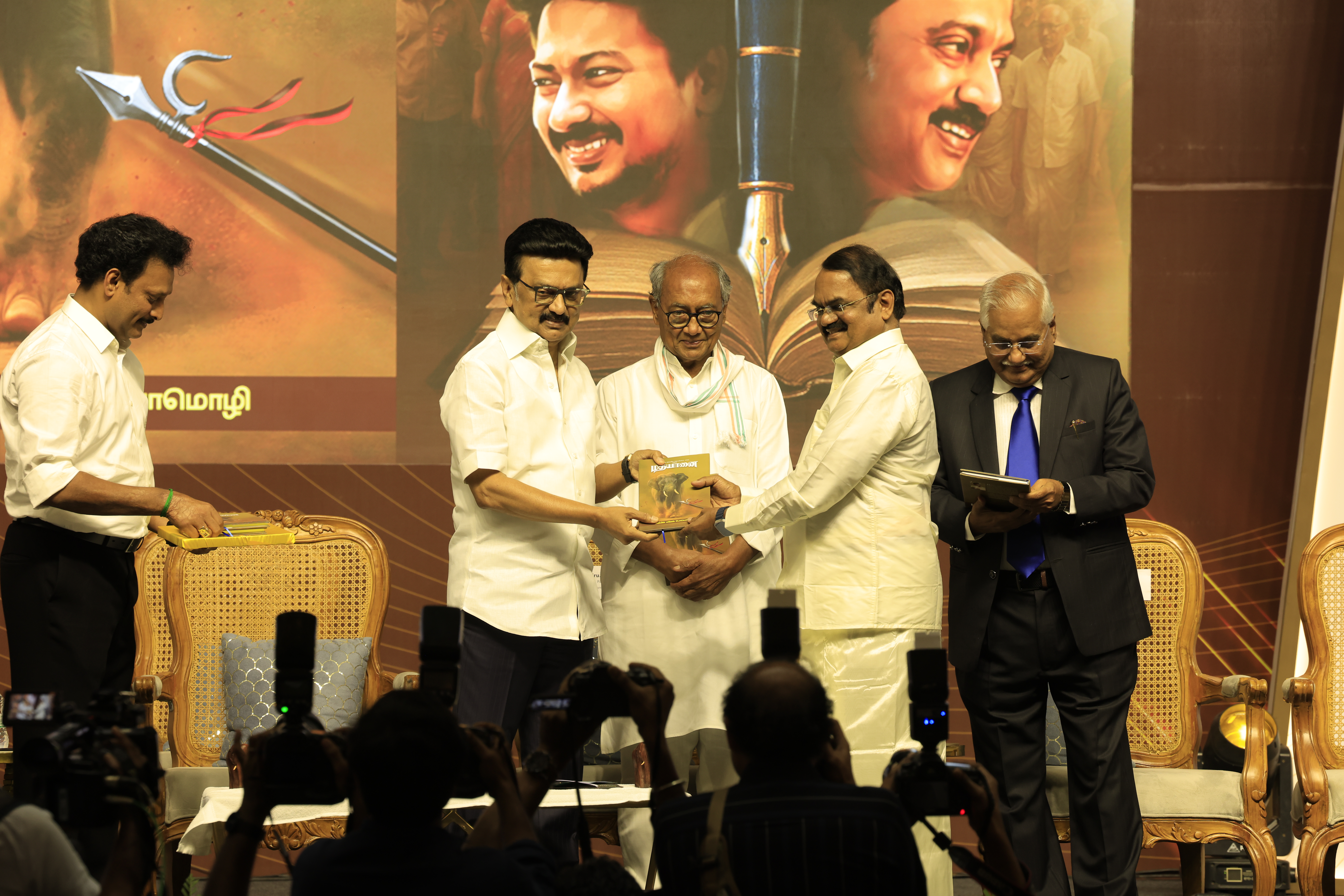 Chief Minister M. K. Stalin presenting the book "Madhayaanai" to Dr.Myslwamy Annadurai