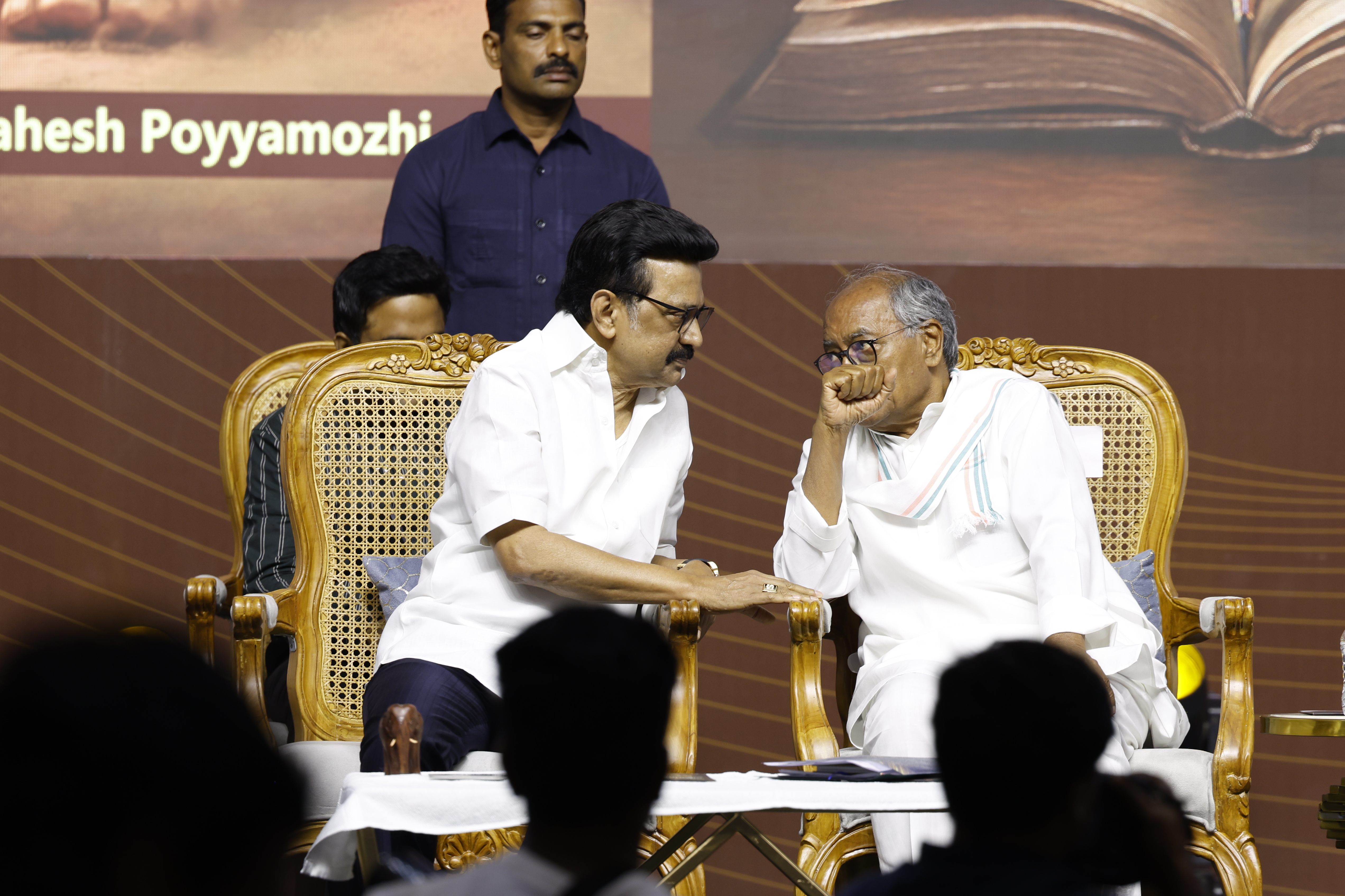 M K Stalin interacting with Digvijaya Singh at the book release function on தேசிய கல்விக் கொள்கை