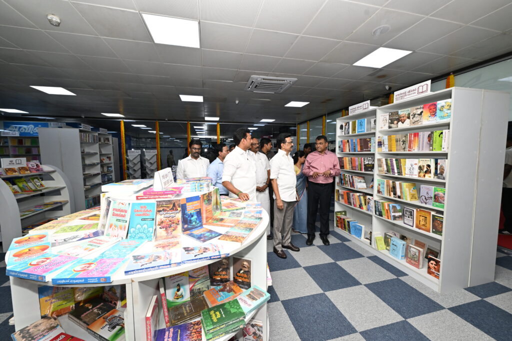 Chief Minister M K Stalin looking at the Book park at the Chennai Central Metro Station along with Anbil Mahesh Poyyamozhi