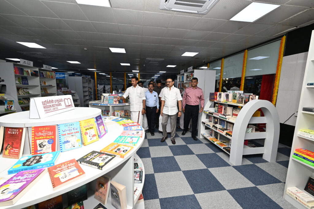 Chief Minister M K Stalin looking at the Book park at the Chennai Central Metro Station along with Anbil Mahesh Poyyamozhi