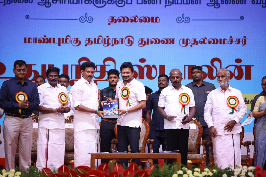 Anbil mahesh poyyamozhi and Udhayanidhi stalin interacting at the function