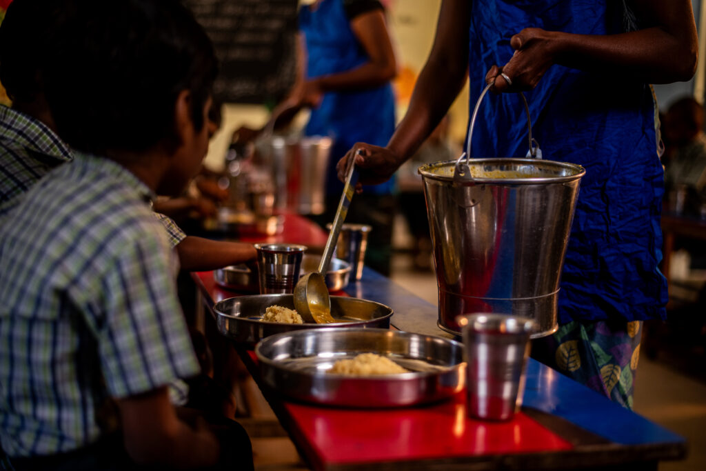 A government school student getting CM breakfast at school